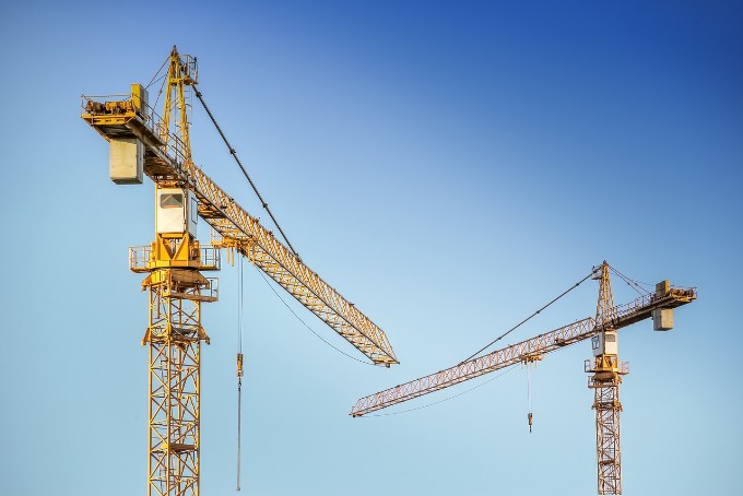 picture of two tower cranes to introduce the paragraph of  NNPE Types and Fields of work